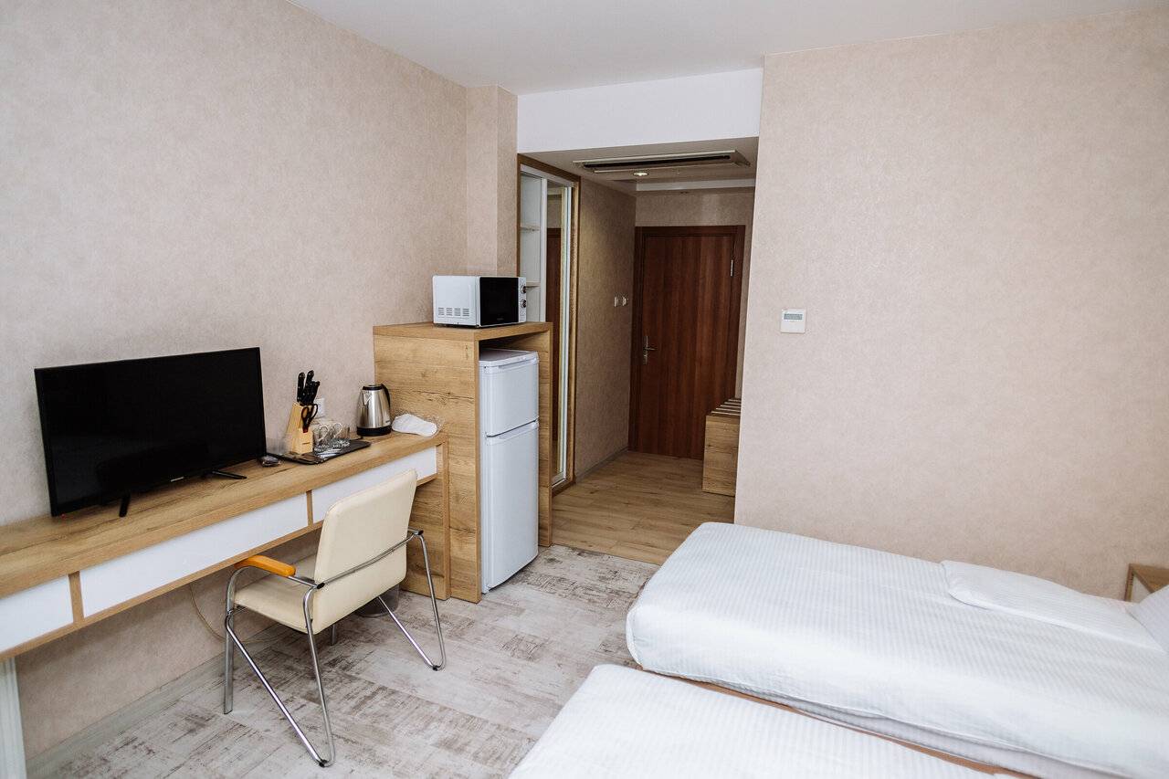 Двухместный номер с 2 отдельными кроватями и душем